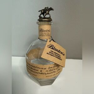 Empty Blanton's Single Barrel Bourbon Whiskey Bottle and “N” Jockey Stopper